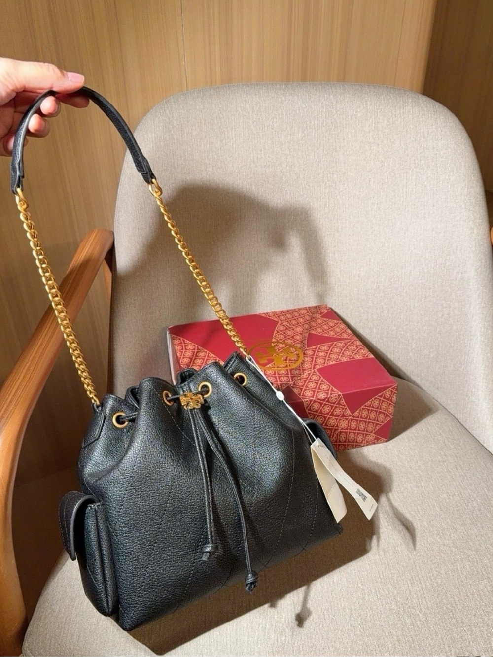 Tory Burch Black Leather Drawstring Bucket Bag with Gold Chain Strap
